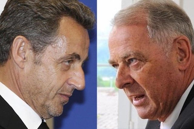 Nicolas Sarkozy et Adolf Ogi, l'ancien Président suisse.